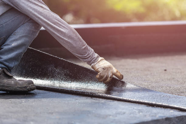 Professional Emergency Waterproofing technician working in Roosevelt, NY